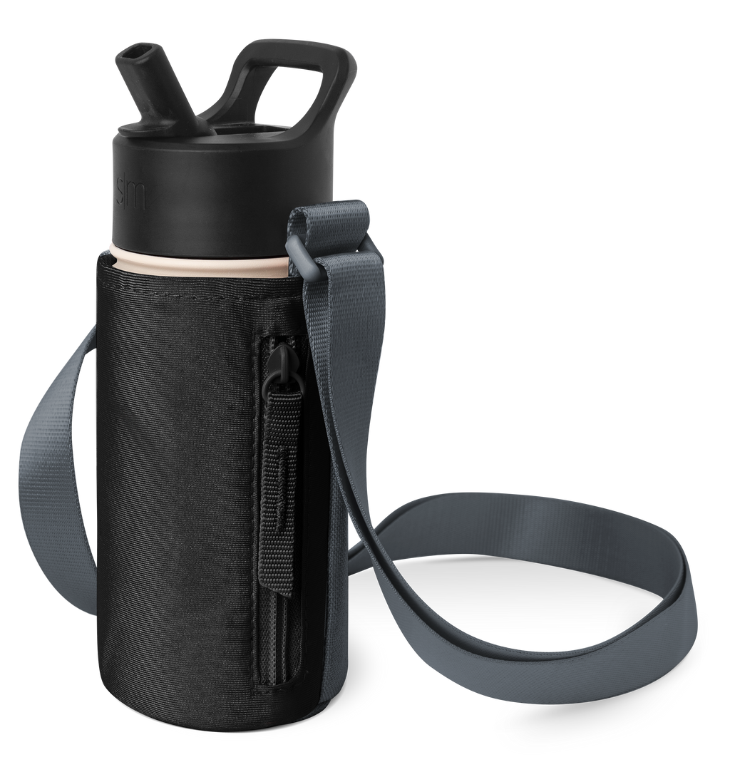 Black water bottle with matching lid next to dark charcoal gray textured carrying case