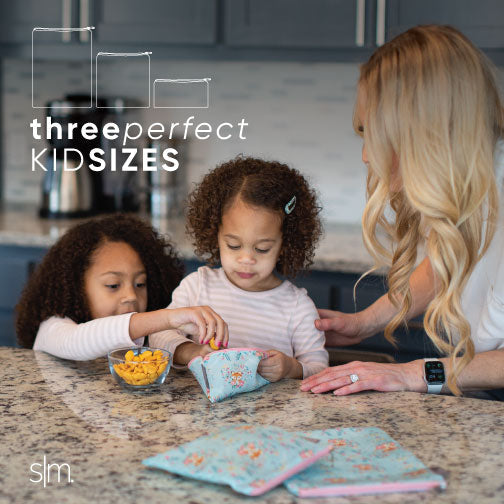 Ellie Snack Bag product displayed on light gray-beige kitchen countertop with soft gray cabinetry in background, white text overlay highlighting Amazon features