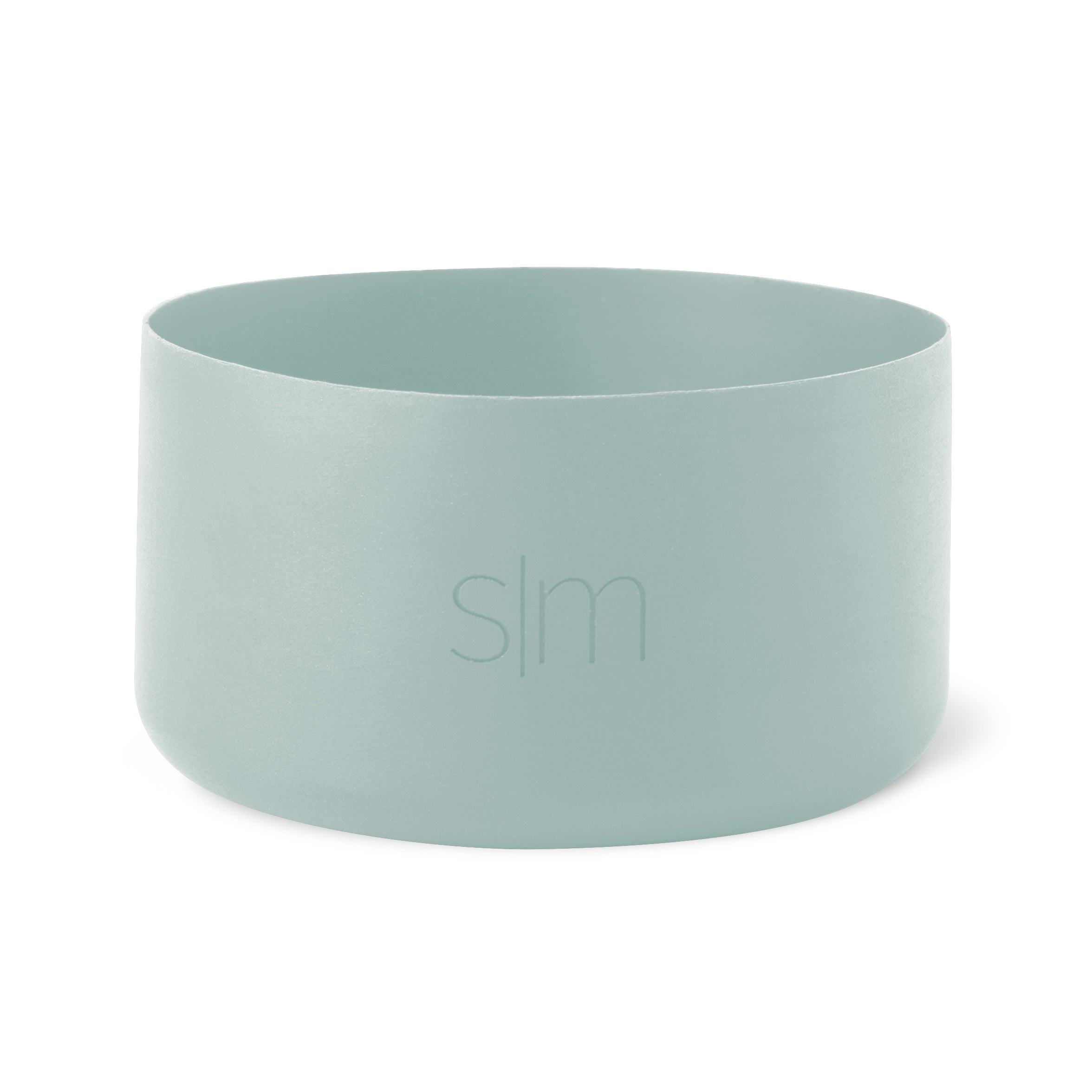 Soft sage green cylindrical boot vessel with muted celadon tone and subtle tonal variations throughout