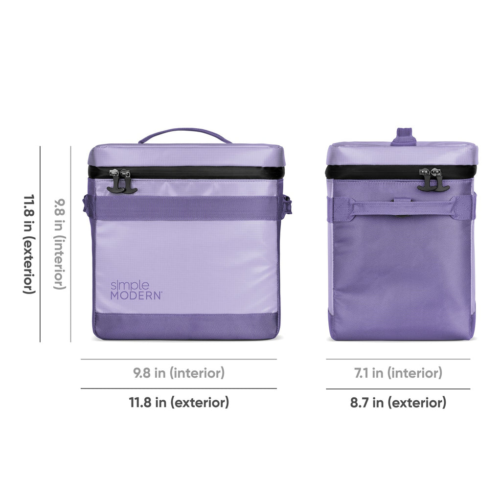 Soft lavender and light purple handbag with darker purple handles and straps, accented by black hardware and trim details