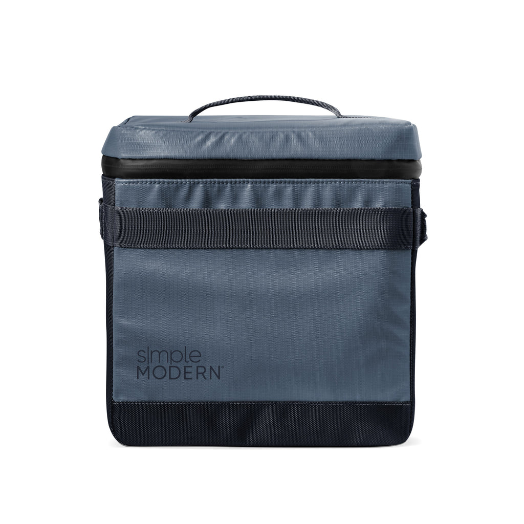 Slate blue-gray backpack with charcoal black accents and straps, featuring a cool-toned minimalist design.