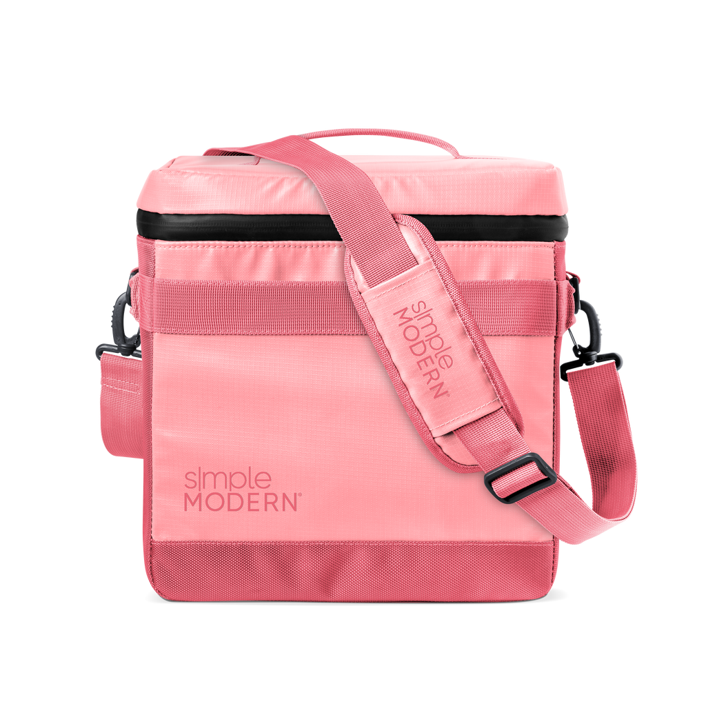 Pink and black minimalist design with soft pastel to coral tones, horizontal stripe detail, and metal hardware accents