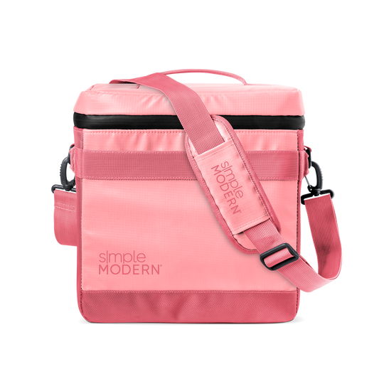 Pink and black minimalist design with soft pastel to coral tones, horizontal stripe detail, and metal hardware accents