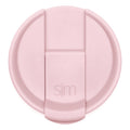Soft pale pink flip-top lid against white background
