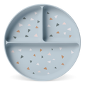 Soft blue-gray decorative plate with small triangle shapes in pale pink, terracotta, charcoal gray, and cream accents