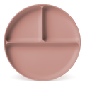 Soft dusty rose-pink ceramic plate with muted warm undertones and subtle gradient shading creating dimensional depth across the surface.