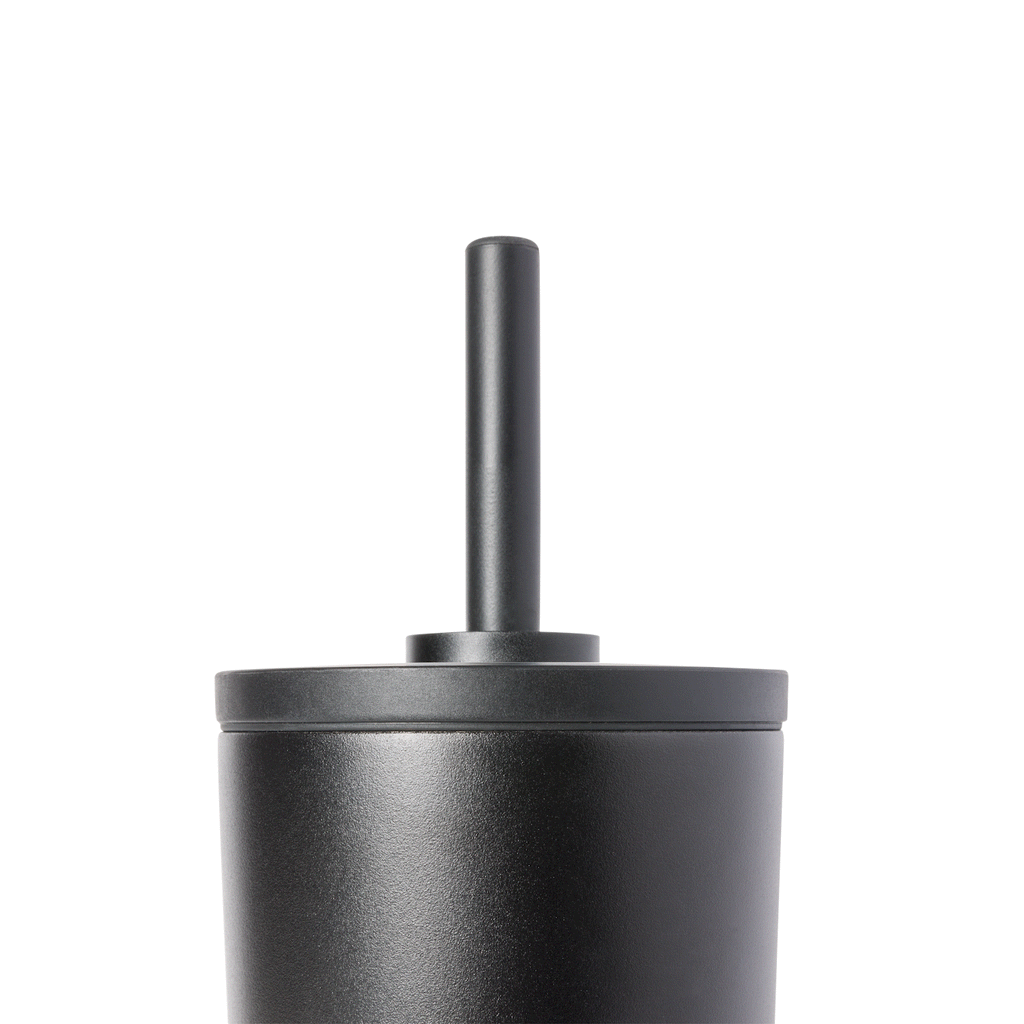 Metallic gray product with dark charcoal and black background, showing subtle highlights and dimensional depth in monochromatic palette