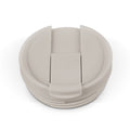 Beige and cream colored flip-top lid with matching components in light taupe, shown in monochromatic neutral tones