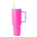 Trek Tumbler insulated beverage cup with hot pink body, sky blue lid, lavender purple handle, and pale yellow-green straw on white background