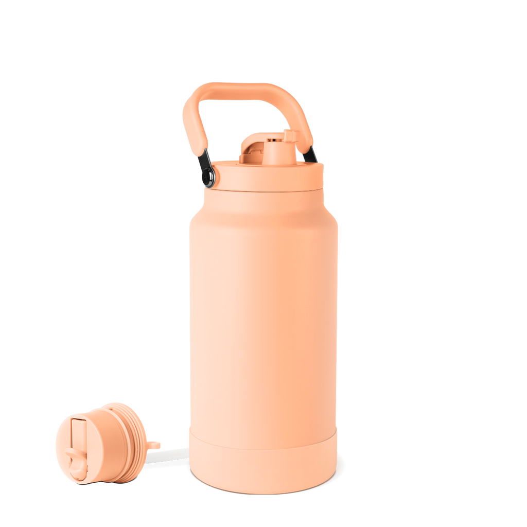 Peachy-coral salmon pink water bottle with matching handle, darker coral cap and base, and small black metal accents