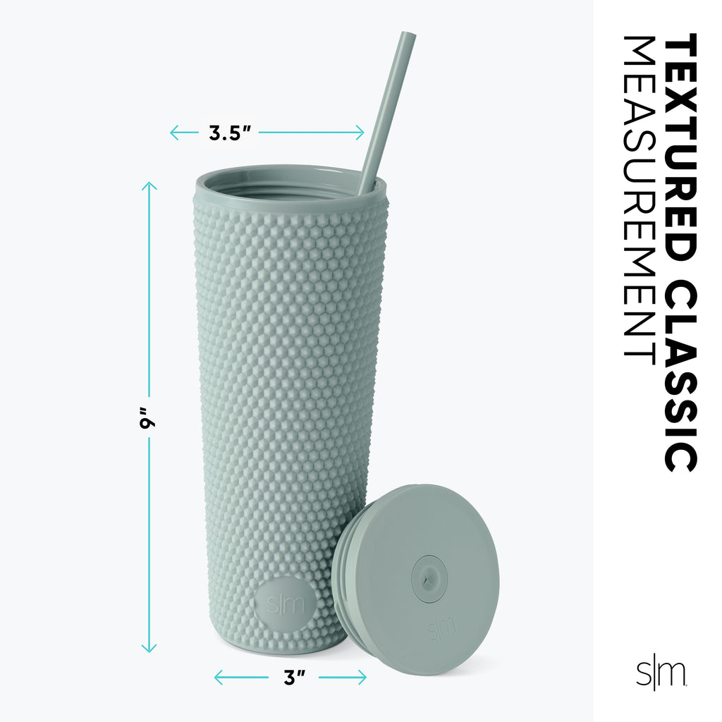 Sage green textured tape measure on pale gray background, displaying measurement markings and soft muted celadon tones in classic design style.