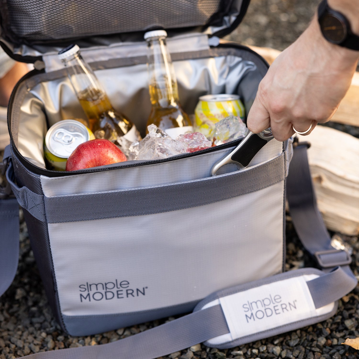 Gray and white insulated cooler bag with red apple and golden amber accents